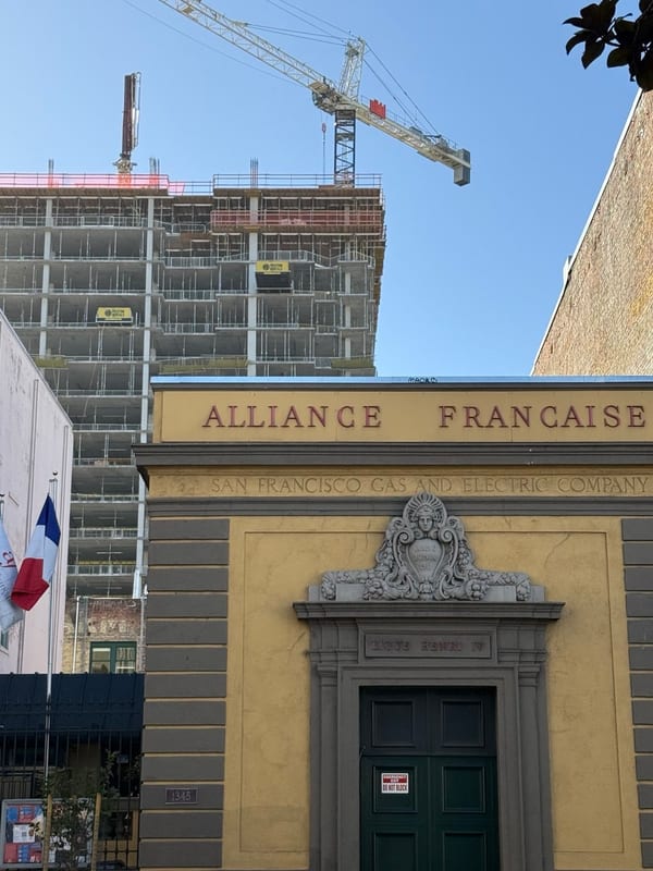 The Alliance Française building under a construction crane