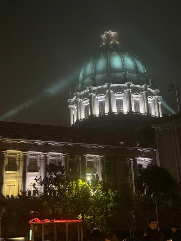 City Hall's dome lit up at night
