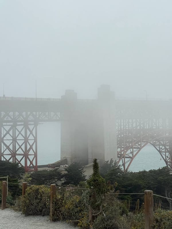 The Golden Gate Bridge going into the fog