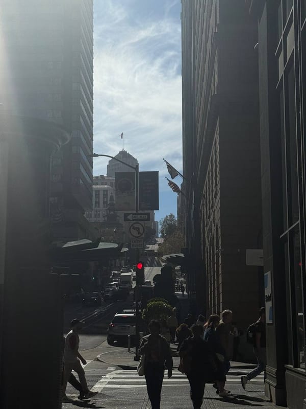 Morning light between tall buildings