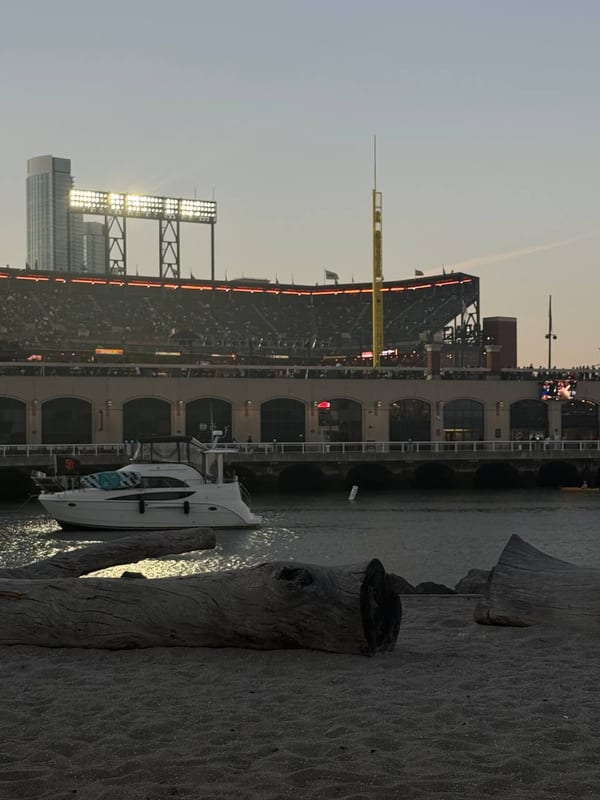 Oracle Park across McCovey Cove at dusk